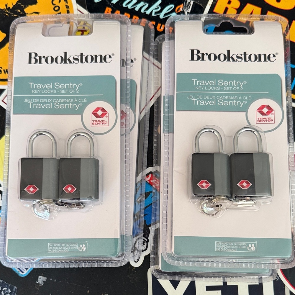 4 Two packs of Brookstone Travel Sentry Key Locks - Gray and Black